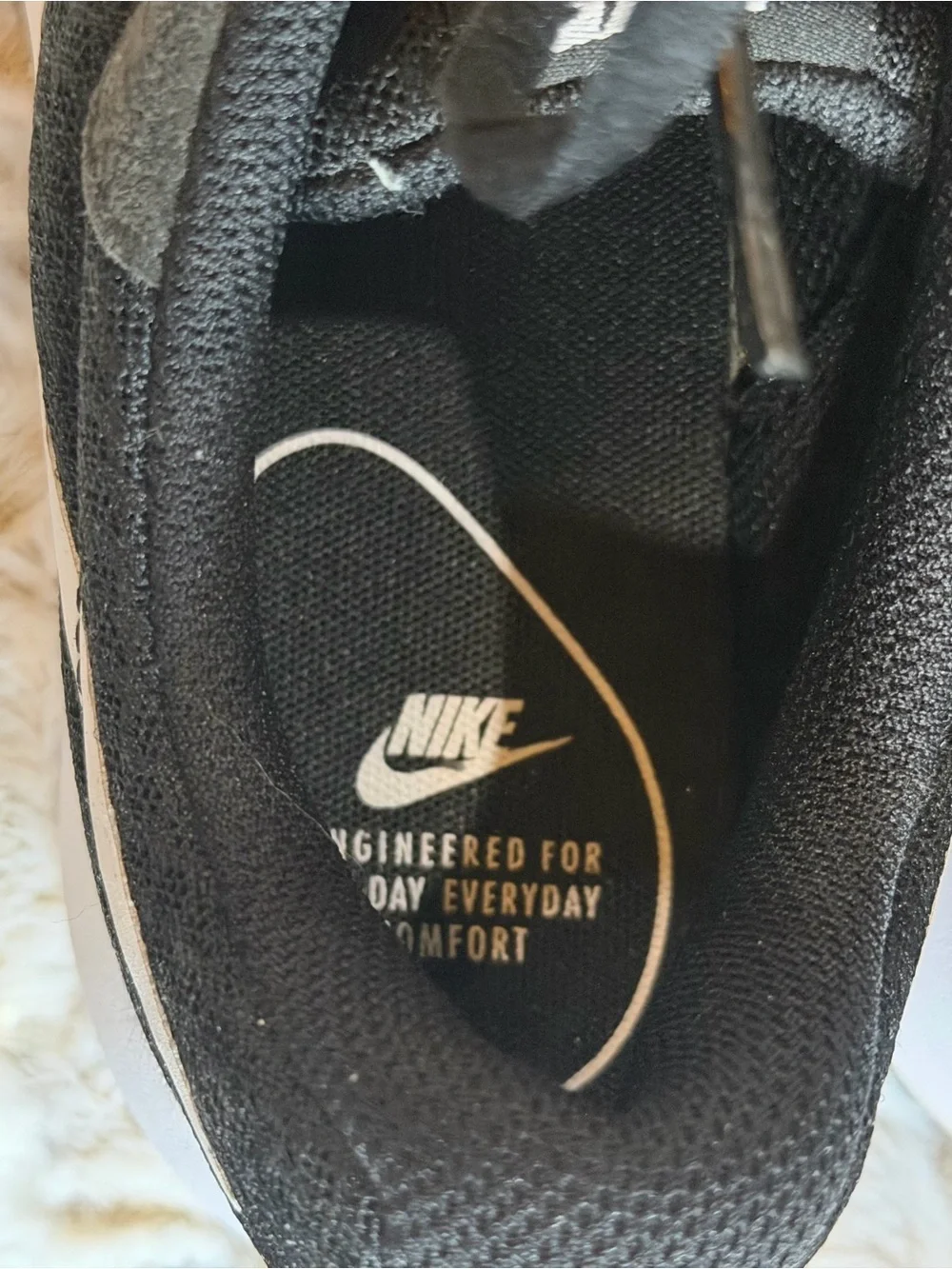 Nike Women’s Black and White Running Sneakers